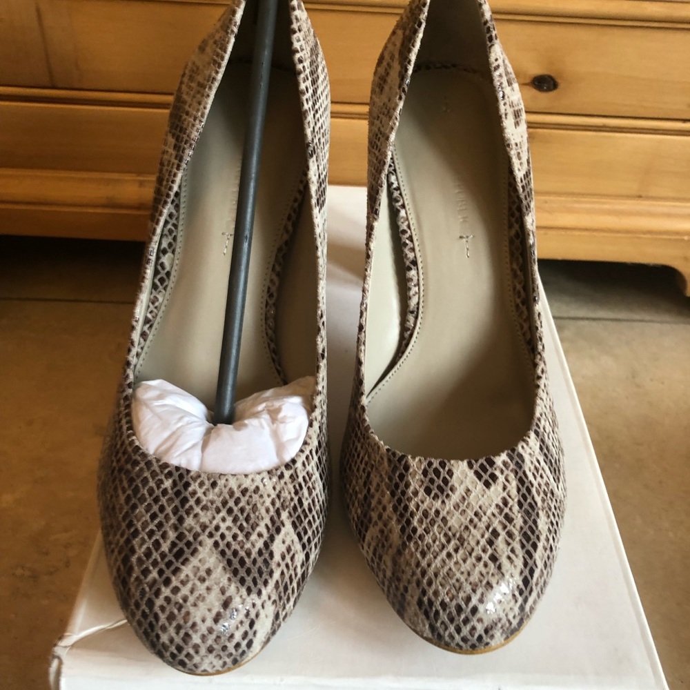 Women’s snake pumps